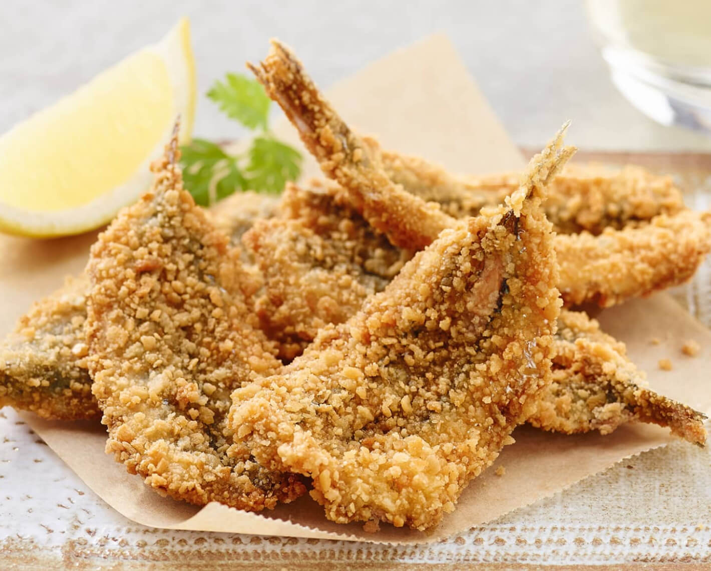 Bruschette di melanzana con pomodorini e filetti di alici