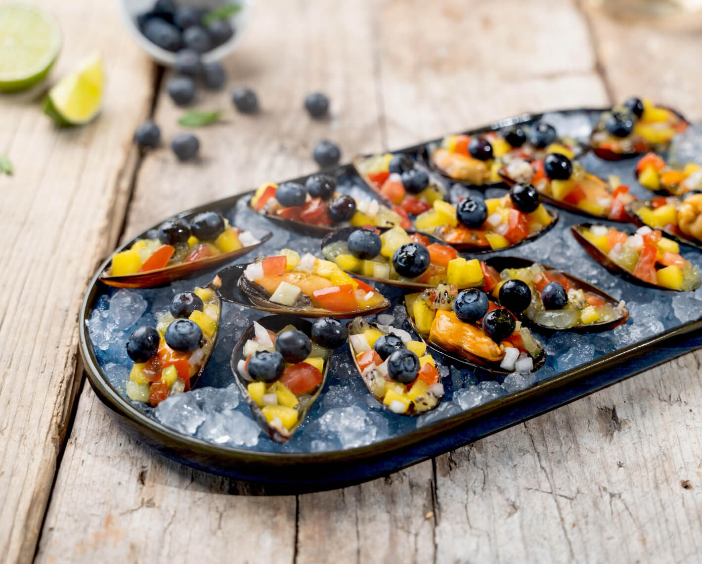 Fruit salad in mussel shells