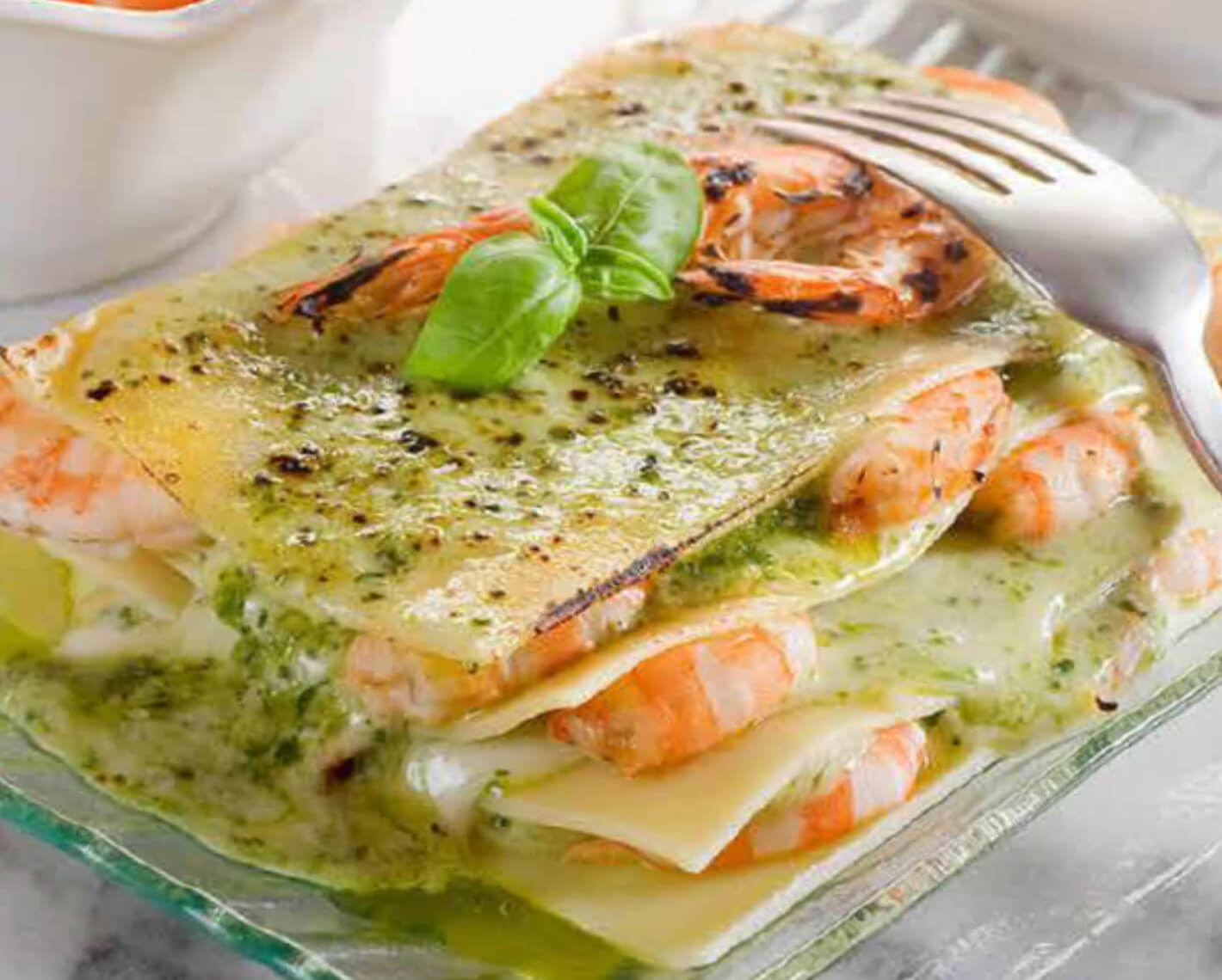 Lasagne con code di Gambero e salsa al basilico